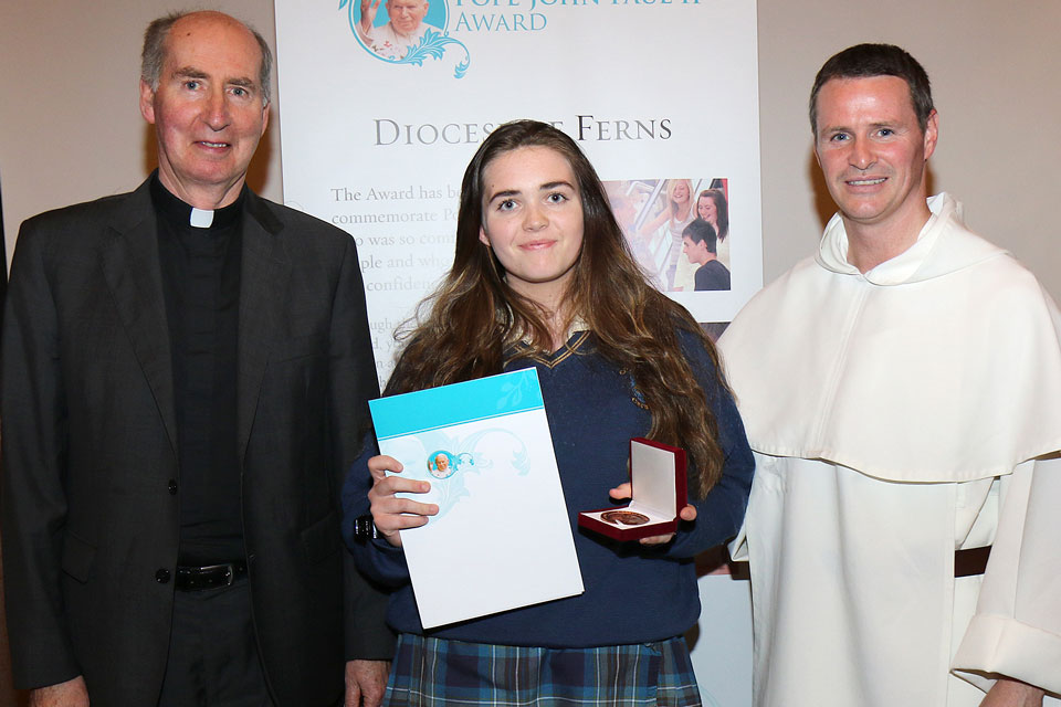 Bishop Brennan and Fr Philip Mulryne present Awards